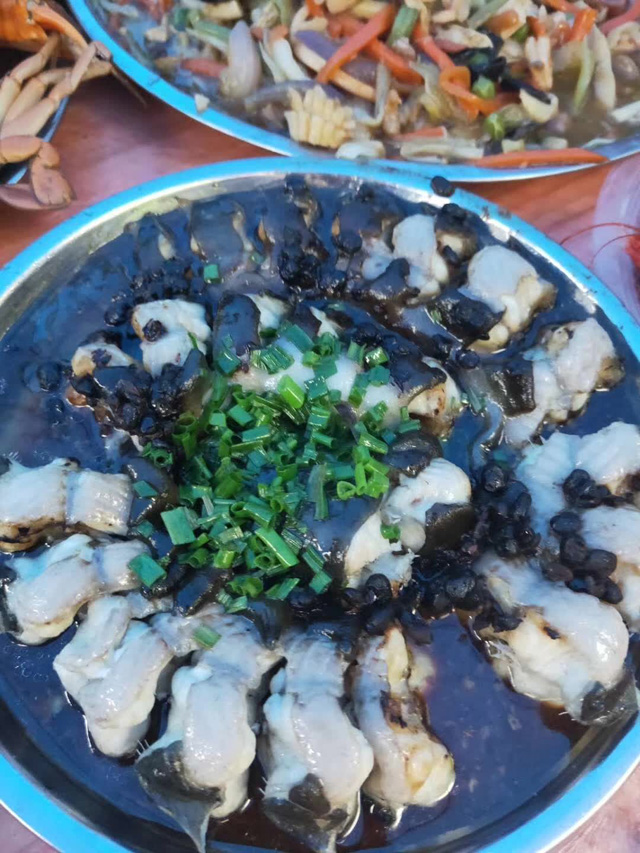 �������~